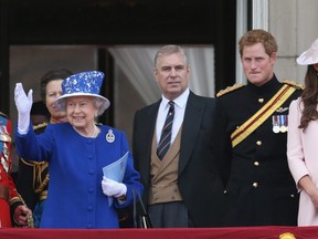 Queen Elizabeth II, Prince Andrew and Prince Harry stand on the balcony at Buckingham Palace during the annual Trooping the Colour Ceremony on June 15, 2013 in London, England. (Photo by Chris Jackson/Getty Images)