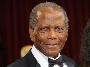 Sidney Poitier arrives on the red carpet for the 86th Academy Awards on March 2, 2014 in Hollywood, Calif.