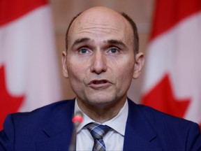 Federal Health Minister Jean-Yves Duclos attends a press conference as the latest Omicron variant emerges as a threat amid the COVID-19 pandemic in Ottawa on January 5, 2022.