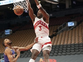 Raptors' OG Anunoby dunks the ball during the first quarter against the Phoenix Suns at Scotiabank Arena on Tuesday, Jan. 11, 2022.