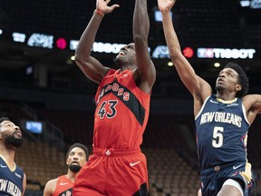 Raptors' Pascal Siakam drives to the basket as New Orleans Pelicans' Herbert Jones tries to defend during the first quarter at Scotiabank Arena on Sunday, Jan. 9, 2022.