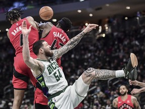 Milwaukee Bucks forward Sandro Mamukelashvili (54) is unable to reach a rebound in the third quarter during the game against the Toronto Raptors at Fiserv Forum.