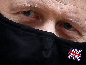 British Prime Minister Boris Johnson leaves the Downing Street in London, Britain, January 26, 2022.
