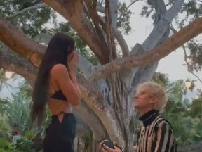 Machine Gun Kelly proposes to Megan Fox in this screengrab of a video posted on Fox's Instagram account.