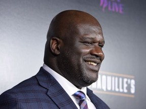 NBA legend Shaquille O'Neal attends the grand opening of Shaquille's At L.A. Live at LA Live on March 09, 2019 in Los Angeles, California.