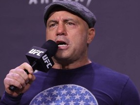 Joe Rogan introduces fighters during the UFC 269 ceremonial weigh-in at MGM Grand Garden Arena in Las Vegas, Dec. 10, 2021.