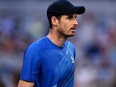 Britain's Andy Murray reacts during his second round match against Japan's Taro Daniel during the Australian Open at Melbourne Park, in Melbourne, Jan. 20, 2022.