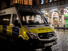 A police van parked outside Charing Cross Station.