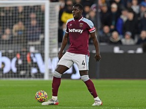 West Ham United's French defender Kurt Zouma controls the ball during the English Premier League match between West Ham and Watford at the London Stadium, in London, England, Tuesday, Feb. 8, 2022.