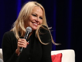 Pamela Anderson takes part in a question and answer session at the Calgary Expo on Sunday April 28, 2019.