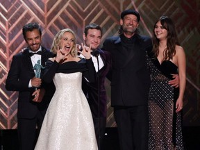 The cast of "CODA" receives the award for Outstanding Performance by a Cast in a Motion Picture for "CODA” at the 28th Screen Actors Guild Awards, in Santa Monica, Calif., Sunday, Feb. 27, 2022.