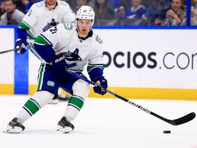 Nils Höglander (above) had been skating on a line with Elias Pettersson and Alex Chiasson at practice when he came up lame with what seemed to be an upper left leg or groin problem.