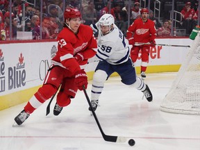 Top rookie point-getter Michael Bunting of the Maple Leafs, here chasing Moritz Seider during a game at Little Caesars Arena in January, will likely finish behind the Wings D-man in the Calder Trophy voting.