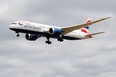 A British Airways Boeing 787 comes in to land at Heathrow airport in west London. (Photo by ADRIAN DENNIS/AFP via Getty Images)