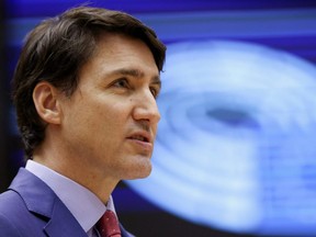 Prime Minister Justin Trudeau addresses European lawmakers ahead of a NATO summit and G7 meeting, amid Russia's invasion of Ukraine, in Brussels, Belgium, Wednesday, March 23, 2022.