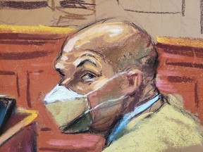 Lawrence Ray sits as Assistant U.S. Attorney Lindsey Keenan (not seen) speaks during opening statements in his trial in New York, U.S., March 10, 2022 in this courtroom sketch.