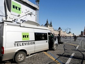 Vehicles of Russian state-controlled broadcaster RT are seen in Red Square in Moscow, March 18, 2018.