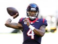 HOUSTON, TEXAS - JANUARY 03: Deshaun Watson #4 of the Houston Texans participates in warmups prior to a game against the Tennessee Titans at NRG Stadium on January 03, 2021 in Houston, Texas. (Photo by Carmen Mandato/Getty Images)