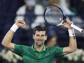The Dubai Duty Free Tennis Centre, Dubai, United Arab Emirates - February 23, 2022 Serbia's Novak Djokovic celebrates winning his second round match against Russia's Karen Khachanov.