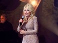 Dolly Parton performs "9 to 5" at the Billboard Women in Music event in December 2020.