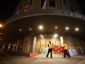 Southern Chiefs’ Organization banners are installed on The Hudson’s Bay Company heritage building in Winnipeg Thursday, April 21, 2022. One of the landmark stores formerly run by the Hudson's Bay Co. is about to undergo a major transformation in the name of reconciliation with Indigenous people. THE CANADIAN PRESS/John Woods