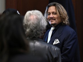 Actor Johnny Depp is seen in the courtroom during his defamation case against Amber Heard at Fairfax County Circuit Court, Virginia, April 12, 2022.