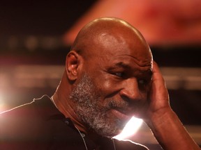 Former Heavyweight champion Mike Tyson looks on during the official weigh-in between Canelo Alvarez vs Caleb Plant on November 5, 2021 at the MGM Grand Garden Arena in Las Vegas.