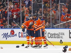 The Edmonton Oilers celebrate a goal by forward Evander Kane (91) for a hat trick during the second period against the Colorado Avalanche at Rogers Place.