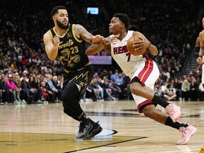Miami Heat's Kyle Lowry drives to the net against Raptors' Fred VanVleet during the first half at Scotiabank Arena on Sunday, April 3, 2022.