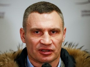 Mayor of Kyiv and former heavyweight boxing champion Vitali Klitschko speaks with journalists during the opening of the first Ukrainian Territorial Defence Forces recruitment centre in central Kyiv, Ukraine, February 2, 2022.