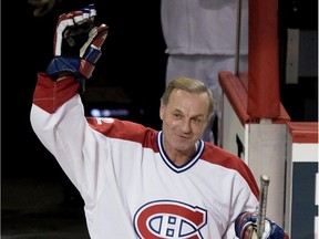 Canadiens legend Guy Lafleur waves to the crowd during celebrations to mark the team's 100th anniversary in Montreal on Dec. 4, 2009.