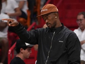 Miami Heat forward Jimmy Butler gestures from the bench during the second half in game five of the first round for the 2022 NBA playoffs against the Atlanta Hawks at FTX Arena.