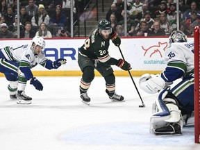 Minnesota Wild right wing Mats Zuccarello (36) is unable to convert on a scoring attempt against Vancouver Canucks goaltender Thatcher Demko (35) during the first period of an NHL hockey game Thursday, April 21, 2022, in St. Paul, Minn.