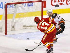 Calgary Flames Johnny Gaudreau scores on empty Anaheim Ducks net to seal the game in third period NHL action at the Scotiabank Saddledome in Calgary on Wednesday, February 16, 2022.