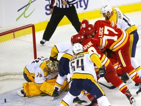 The Calgary Flames battle the Nashville Predators at Scotiabank Saddledome in Calgary on Nov. 2, 2021. Milan Lucic says the Flames need to have the same mentality as the playoff-chasing Predators will be bringing to their clash on Tuesday in Nashville.