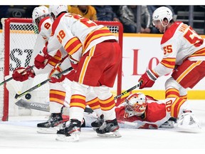Flames goaltender Dan Vladar wasn't able to stop this second-period goal in Tuesday night's 3-2 shootout loss to the Nashville Predators at Bridgestone Arena.