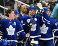 Apr 9, 2022; Toronto, Ontario, CAN; Toronto Maple Leafs forward Auston Matthews (middle) acknowledges a tribute by fans after setting a new Maple Leafs single season record for goals during a break in the action against the Montreal Canadiens at Scotiabank Arena.