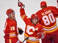 Calgary Flames forward Johnny Gaudreau and his teammates celebrate the forward’s winning and series-clinching goal in overtime against the Dallas Stars during Game 7 of their first-round playoff series at Scotiabank Saddledome on Sunday, May 15, 2022.