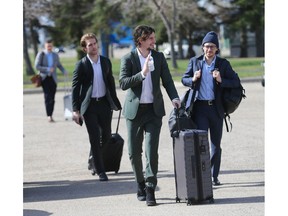 Flames Sean Monahan waves as he and Johnny Gaudreau arrive as the team departs Calgary en route to Dallas, TX on Friday, May 6, 2022. The Flames play the Dallas Stars in games three and four starting Saturday night.