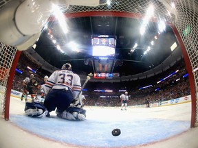Cam Talbot #33 of the Edmonton Oilers looks on after Nick Ritchie #37 of the Anaheim Ducks scored a goal during the third period in Game Seven of the Western Conference Second Round during the 2017 NHL Stanley Cup Playoffs at Rogers Place on May 7, 2017 at Honda Center on May 10, 2017 in Anaheim, California.