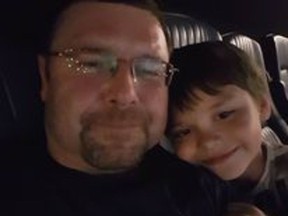 Daniel Winston Robinson, seen with his son, died Aug. 30, 2021, after an "altercation" at the Edmonton Remand Centre. Police have deemed the death non-criminal but Robinson's family continue to push for answers.