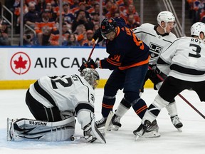 Edmonton Oilers' Evander Kane (91) is stopped by L.A. Kings' goaltender Jonathan Quick (32) during first period of NHL playoff action at Rogers Place in Edmonton, on Monday, May 2, 2022.