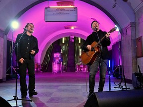Bono, Irish singer-songwriter, activist, and the lead vocalist of the rock band U2, and guitarist David Howell Evans aka "The Edge," perform at subway station which is bomb shelter, in the center of Ukrainian capital of Kyiv on May 8, 2022.