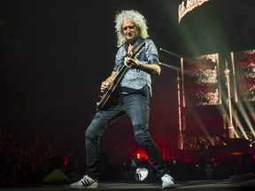 Brian May of Queen and Adam Lambert perform at the Scotiabank Arena in Toronto, July 28, 2019.