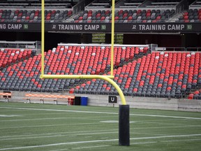 The field is empty, but the stadium screens still show signs for the Ottawa Redblacks' training camp at TD Place, home of the Ottawa Redblacks, in Ottawa on Tuesday, May 17, 2022.