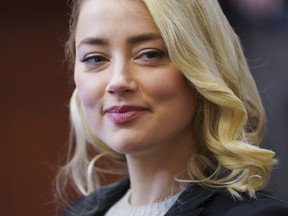 Amber Heard appears in the courtroom at the Fairfax County Circuit Courthouse in Fairfax, Va., Wednesday, May 18, 2022.