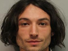In this handout image provided by Hawaii Police Department, Ezra Miller is seen in a police booking photo after his arrest for disorderly conduct and harassment on March 28, 2022 in Hilo, Hawaii.