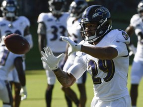 Former Ravens safety Earl Thomas III is seen catching a pass during training camp at Under Armour Performance Center in Owings Mills, Md., Aug. 17, 2020.