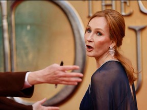 British writer J.K Rowling reacts on the red carpet after arriving to attend the World Premiere of the film "Fantastic Beasts: The Secrets of Dumbledore" in London on March 29, 2022.