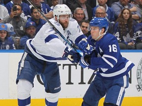 Lightning defenceman Victor Hedman, left, battles against Maple Leafs forward Mitch Marner during Game 5 of the first round of the 2022 Stanley Cup Playoffs at Scotiabank Arena in Toronto, Tuesday, May 10, 2022.